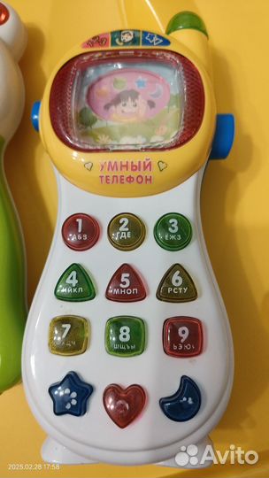 Детские игрушки телефон