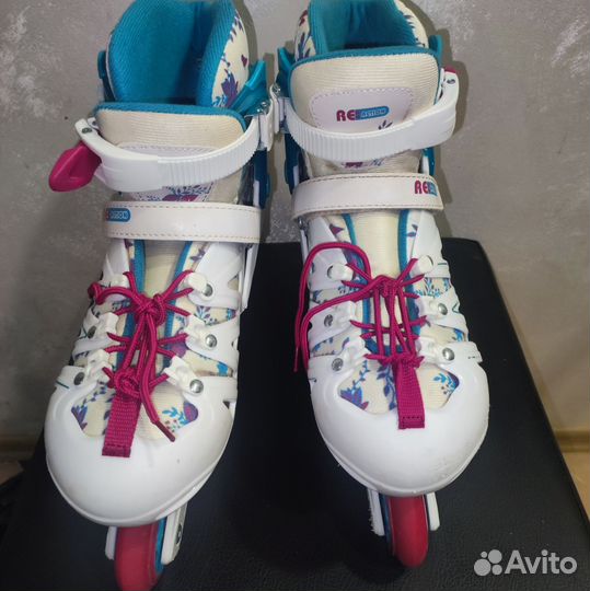 Роликовые коньки