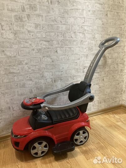 Машинка каталка с ручкой