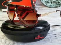 Солнцезащитные очки Carrera унисекс 2024