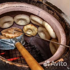 Фоторепортаж: Как пекут хлеб в тандыре