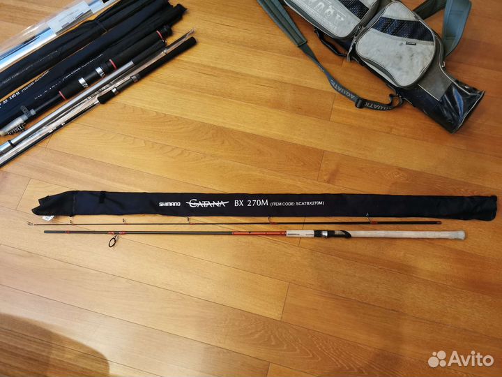 Пакетом: 4 удилища Shimano, багор, чехол