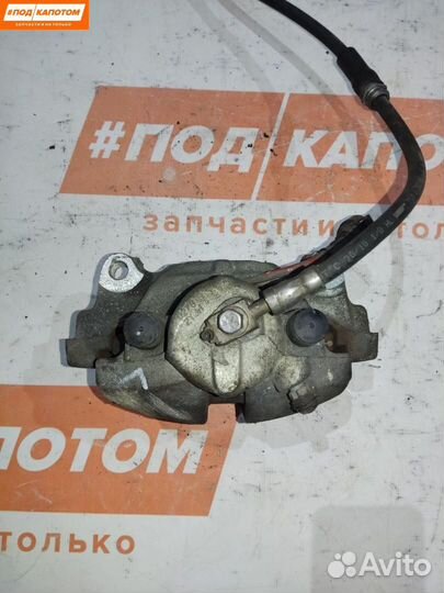 Суппорт тормозной передний левый Skoda Fabia