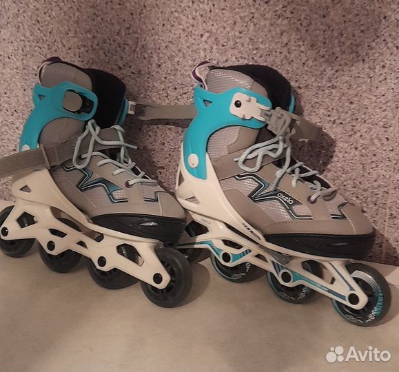 Роликовые коньки