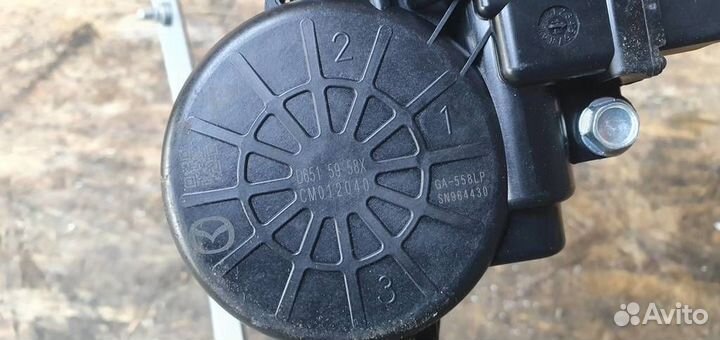 Стеклоподъемник электрический передний левый Mazd