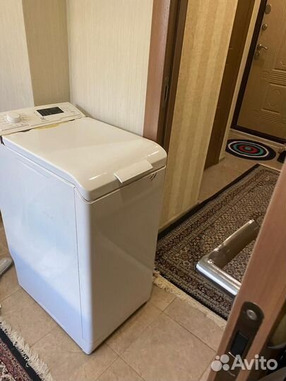 Стиральная машина с вертикальной загрузкой