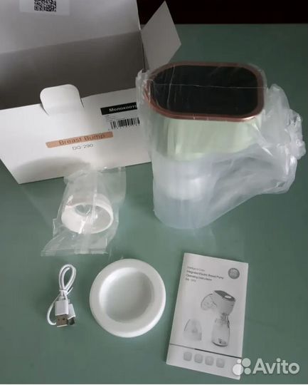Молокоотсос электрический новый
