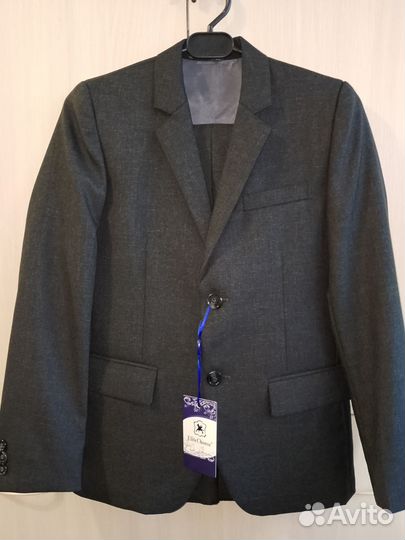 Костюм школьный 140 новый
