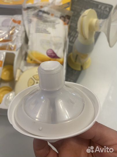 Молокоотсос medela swing flex электрический