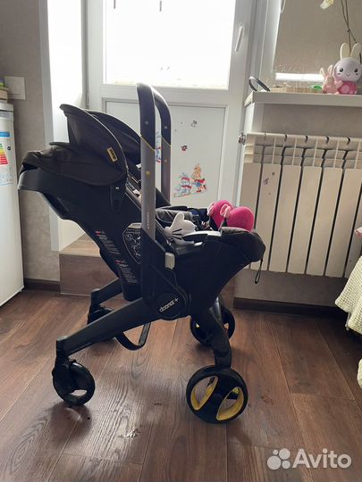 Детская коляска автолюлька doona plus