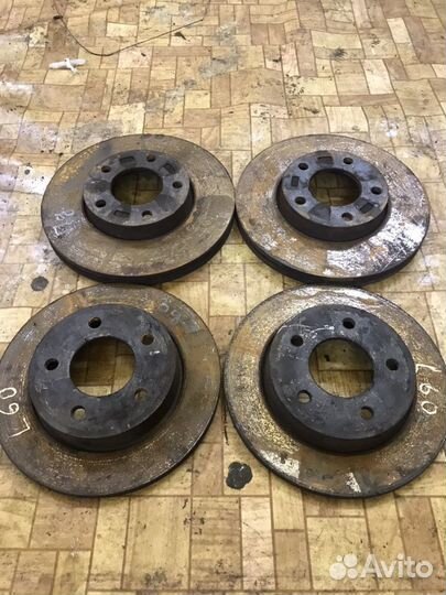 Тормозной диск Мазда 3 бк