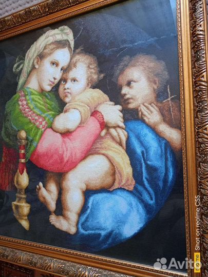 Мадонна с младенцем Рафаэля Санти