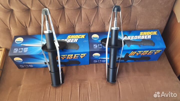 Амортизатор (стойка) передний Рено Логан Ларгус