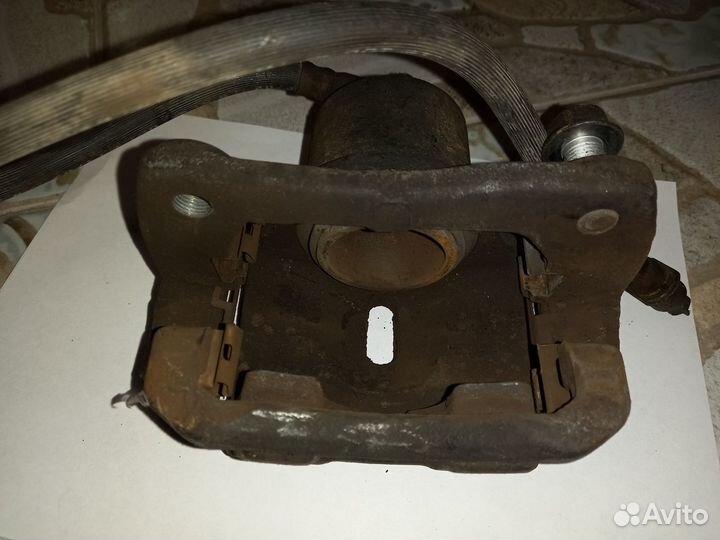 Суппорт на Toyota Funcargo NCP20 2NZ-FE