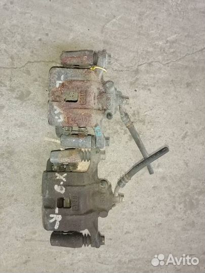 Суппорт тормозной задний Mazda Xedos 9 1998г