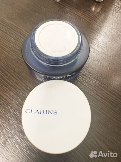 Пустые баночки от крема Clarins