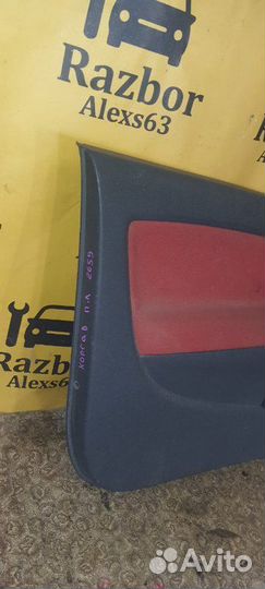 Обшивка двери левая Opel Corsa D 1.4L 2007