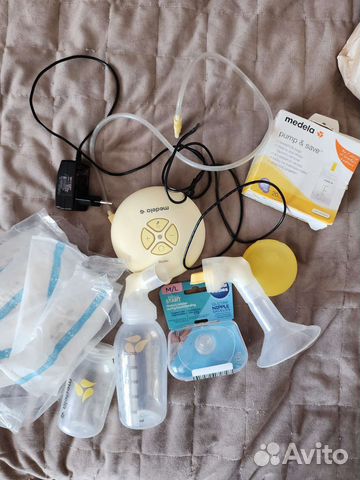 Молокоотсос medela swing