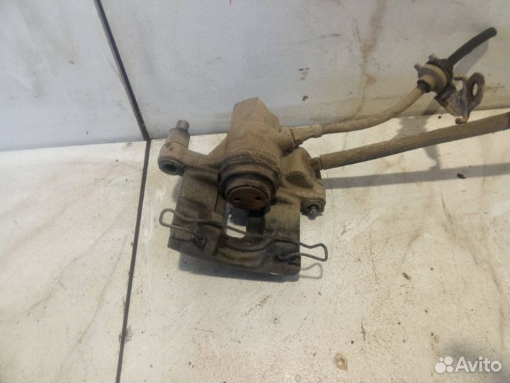 Суппорт тормозной задний левый Ford Focus 2 CB4