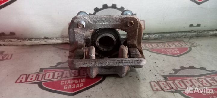 Суппорт тормозной задний правый Honda Cr-V RM4