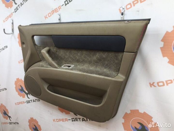 Обшивка двери передняя правая Chevrolet Lacetti