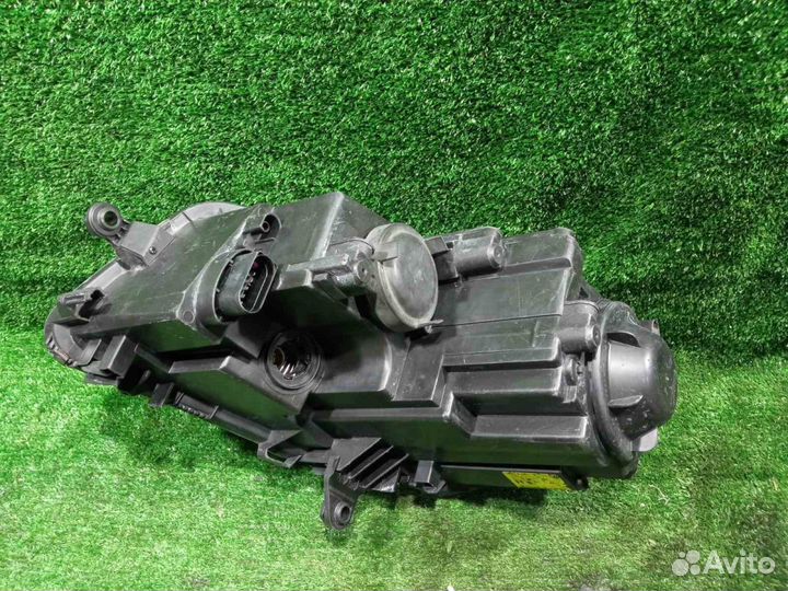 Фара Touran (06-10) R б/у восстановленная