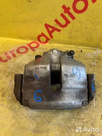 Суппорт тормозной передний левый Volkswagen Golf 6