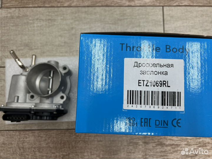 Дроссельная заслонка