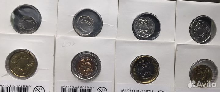 Монеты разных стран, в буклетах