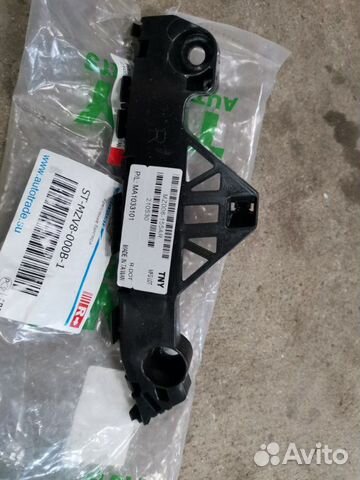 Крепление бампера переднее правое Mazda Axela 2009