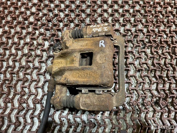 Суппорт задний правый Санта Фе 1 Hyundai Santa Fe