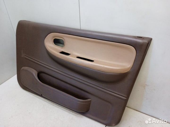 Обшивка двери передняя правая Kia Sportage 1 2.0