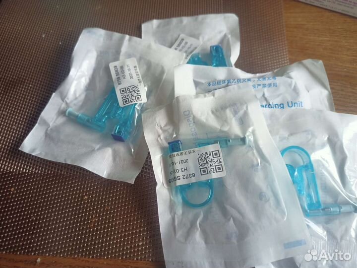 Приспособление для прокола ушей