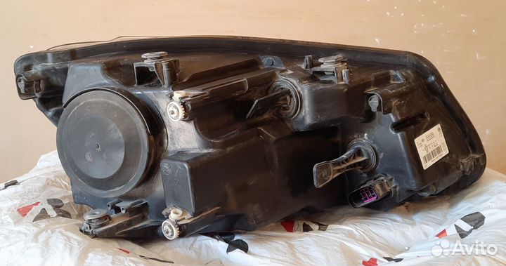Фара левая Volkswagen Cadd