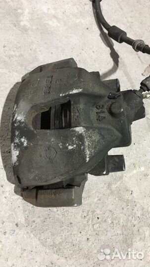 Суппорт тормозной передний правый Mazda 3 BK