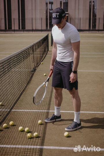 Тренер по большому теннису