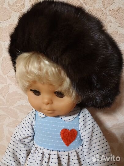 Женские меховые шапки