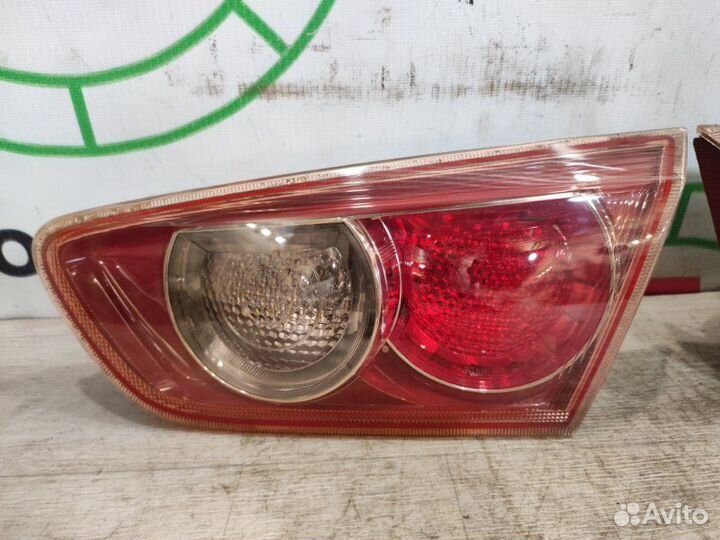 Фонарь в крышку багажника задний Mitsubishi Lancer