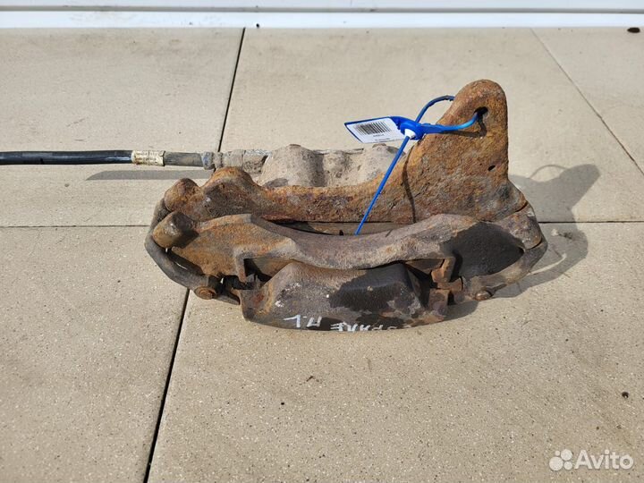 Тормозной суппорт перед лев Chevrolet Нива
