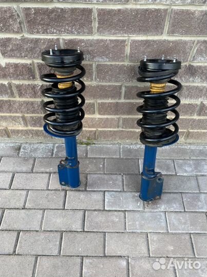 Стойки передние bmw e53