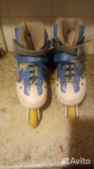 Роликовые коньки