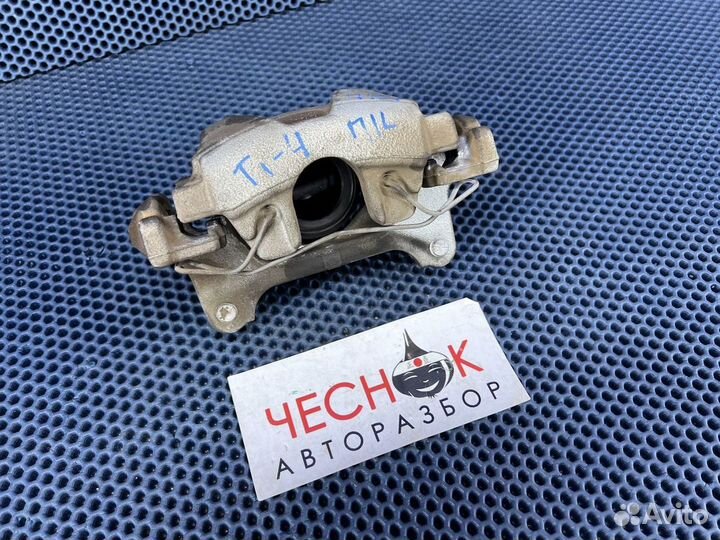 Суппорт тормозной передний левый VW Tiguan NF