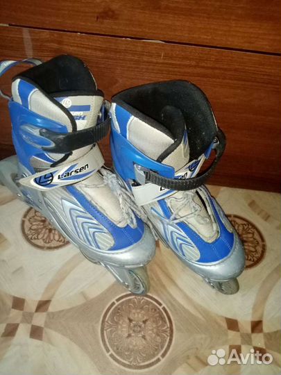 Роликовые коньки