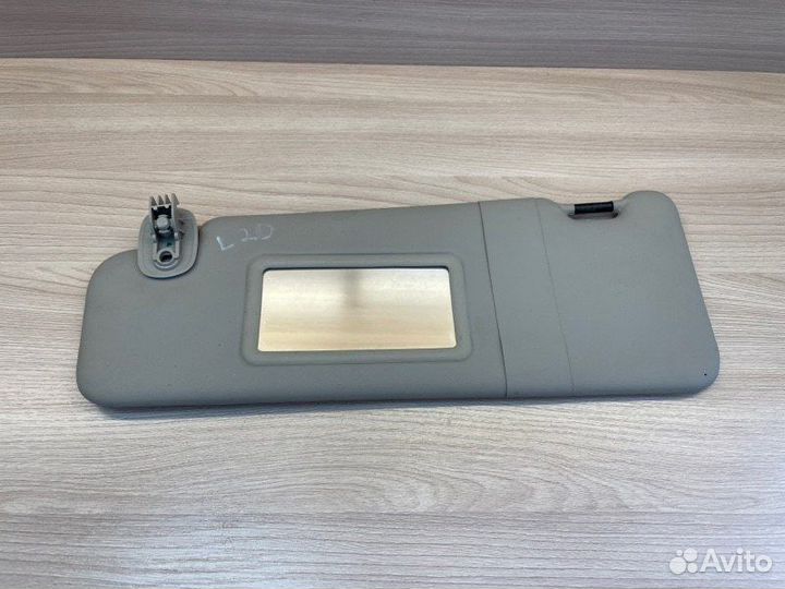 Козырек солнцезащитный левый Renault Logan