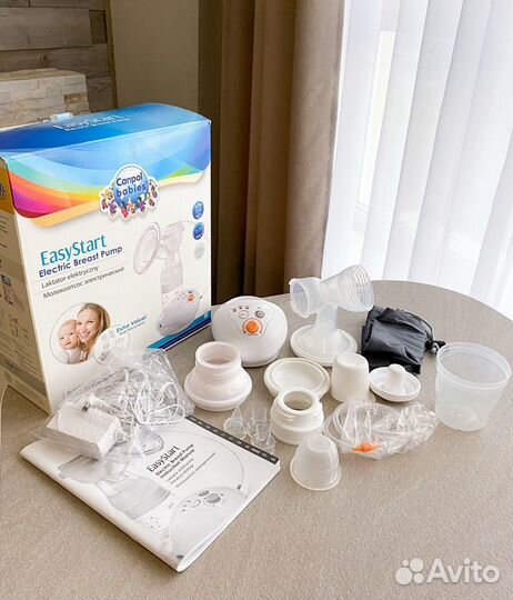 Молокоотсос электрический новый