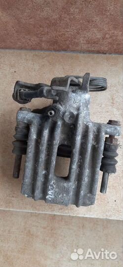 Суппорт Фольксваген Пассат В5 задний левый