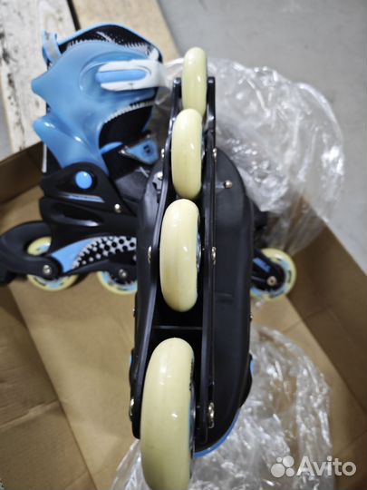 Роликовые коньки