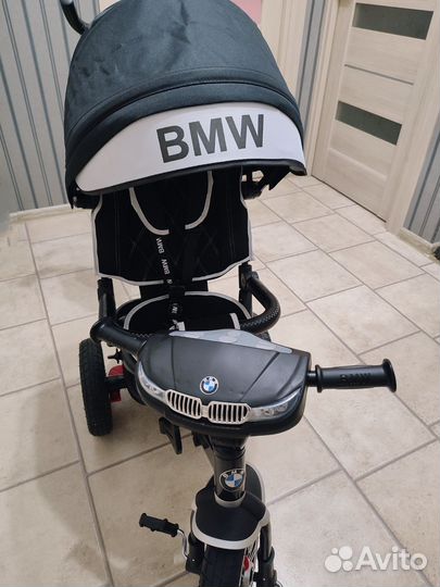 Трехколесный велосипед BMW