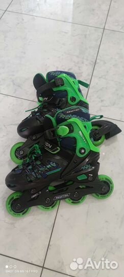 Роликовые коньки