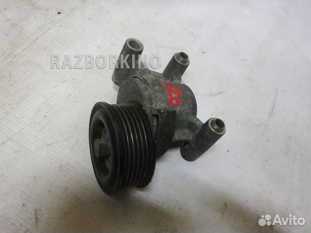 Ролик натяжителя ремня